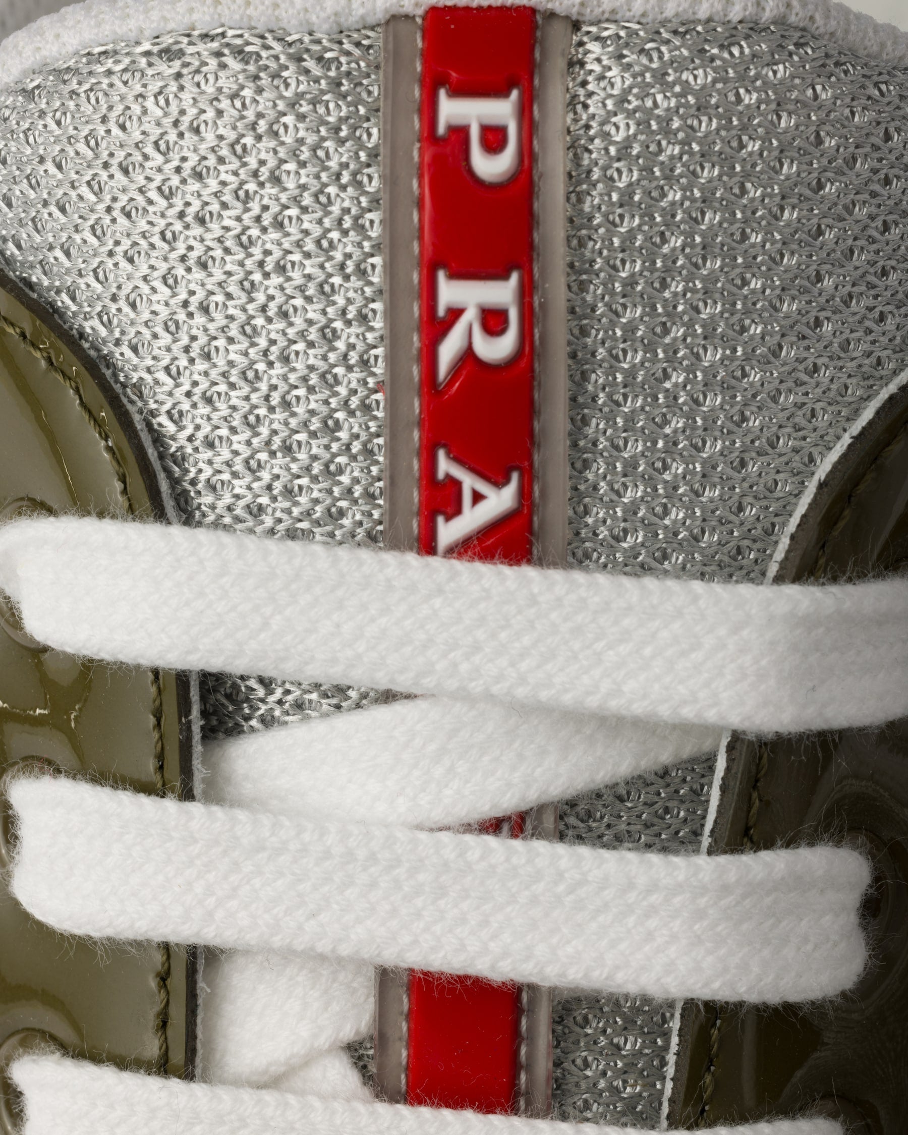 Prada America’s Cup en cuir verni et tissu